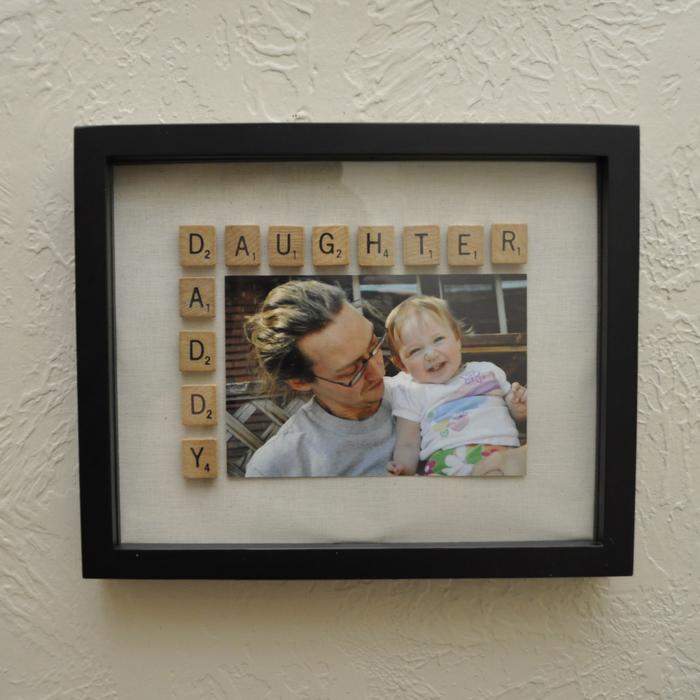 Framed photo with Scrabble tiles spelling Daughter and Daddy