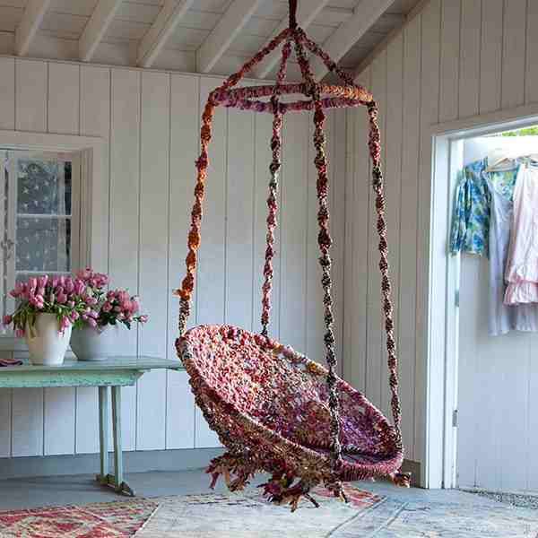 Hanging chair near a window