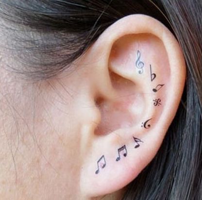 Ankle music note tattoo