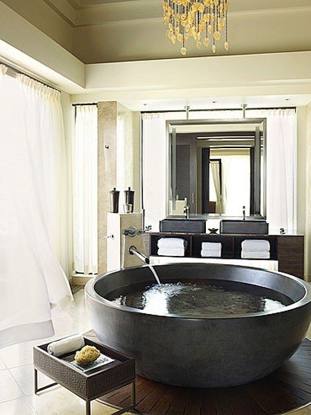 Deep soaking bathtub in a styled bathroom