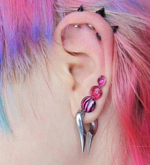 black spikes pink studs and stretched lobe weight
