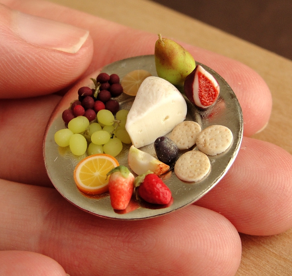 delicious-mini-foods04 Silver platter of miniature cheeses, grapes, fig, pear, and strawberries