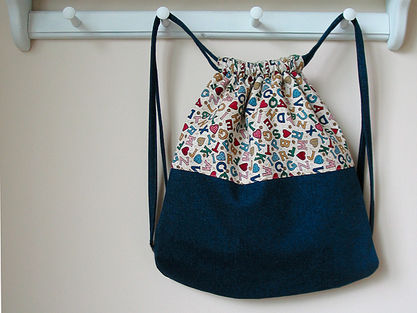 Backpack with bias tape straps