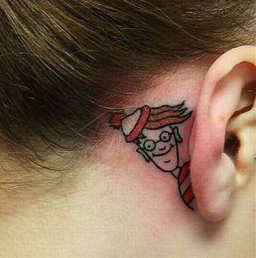 Where's Waldo peeking tattoo behind the ear