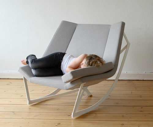 Wide geometric rocking lounge large enough to curl up in