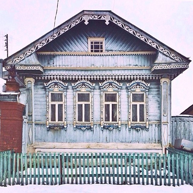 Traditional wooden house on a quiet street