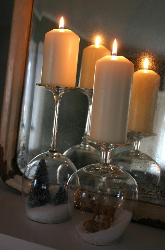 Inverted wine glass candle holders with winter scenes