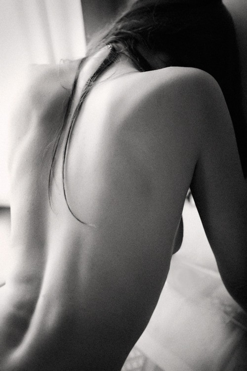 Fashion photograph with open-back silhouette