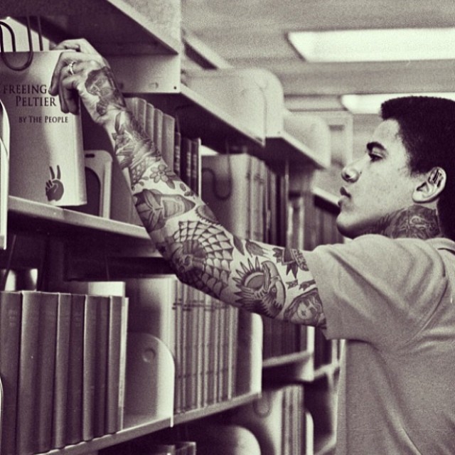 Iconic figure with digital tattoos by Cheyenne Randall
