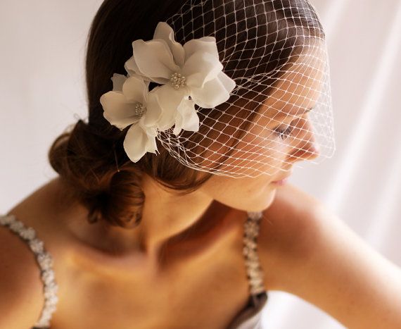 Birdcage veil with vintage bouquet styling
