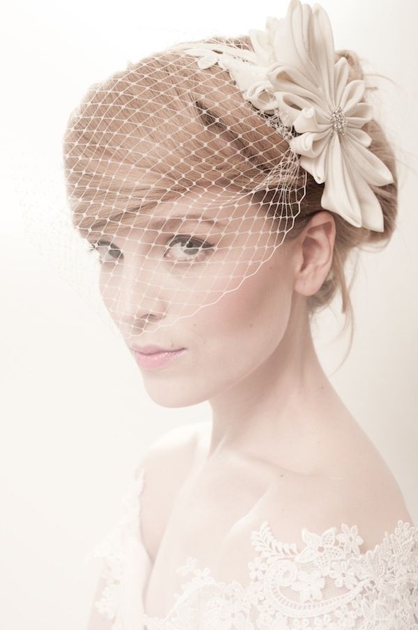 Ivory birdcage veil with ribbon trim