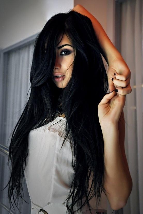 Long dark hair with a clean side part