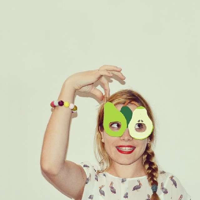 Three pears cardboard mask held with clothespin