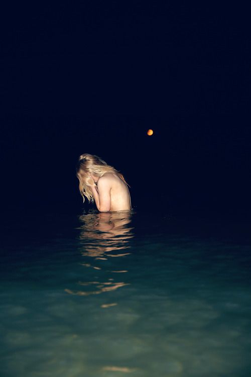 Hair in the wind near water