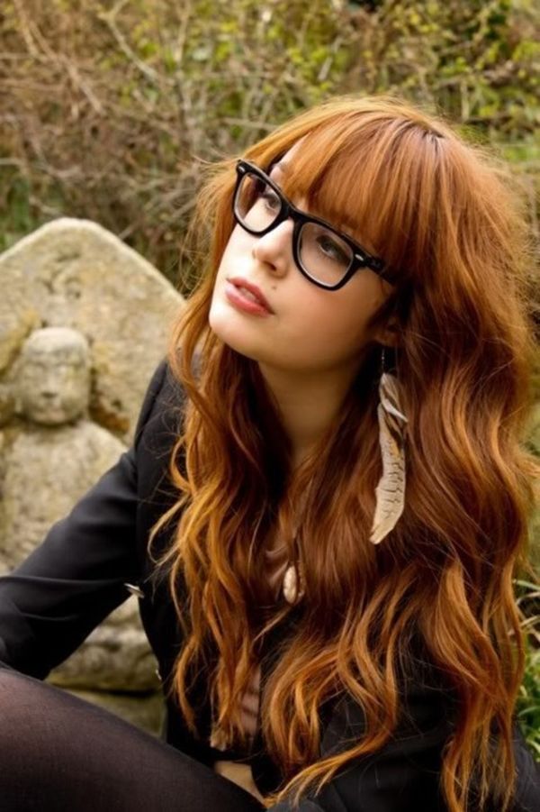 Long red hair with face-framing layers