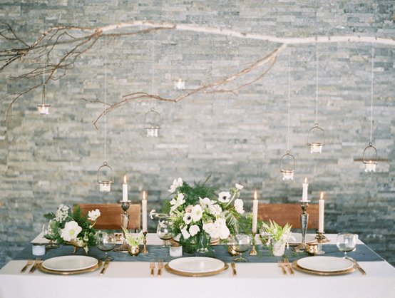 Cream winter table with low seasonal arrangement