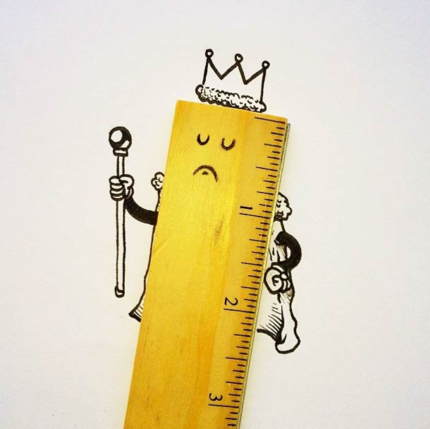 Wooden ruler drawn as a royal ruler with crown and scepter