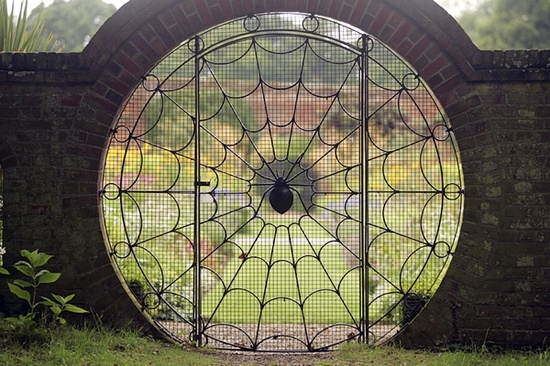Wide garden gate opening to a path