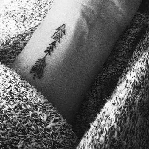 Symbolic arrow tattoo idea