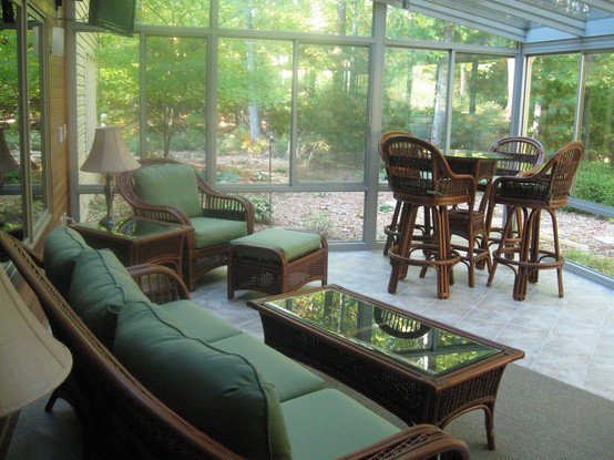 Wide sunroom view with garden light