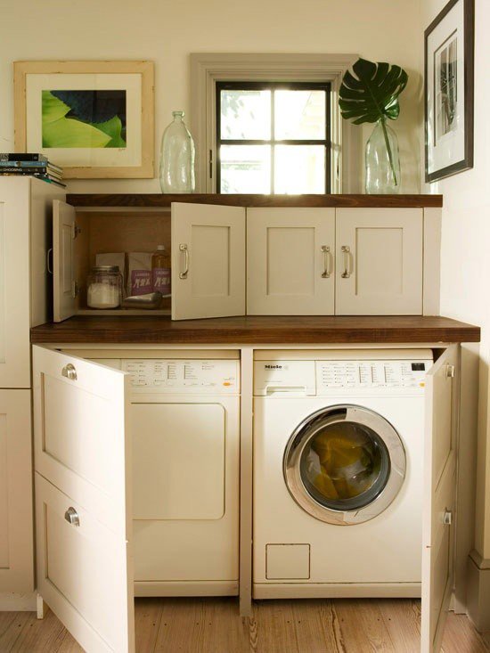 Stylish laundry space with patterned surfaces