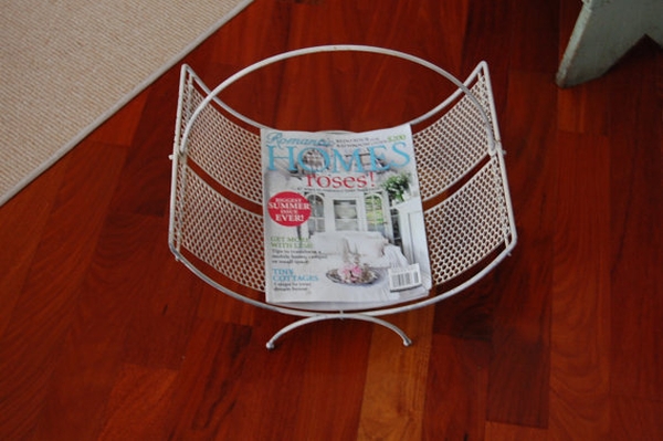 Leather sling magazine rack