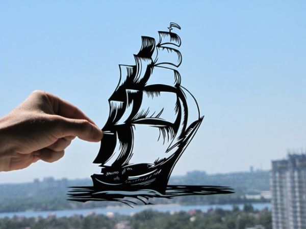 Original-handmade-papercuts09 Paper silhouette with connected figures