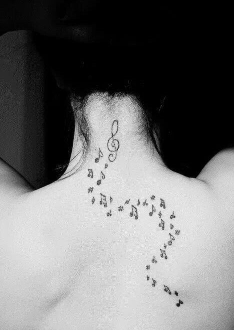 Rib cage music tattoo
