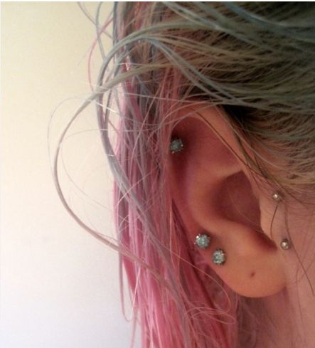 iridescent studs with vertical tragus balls