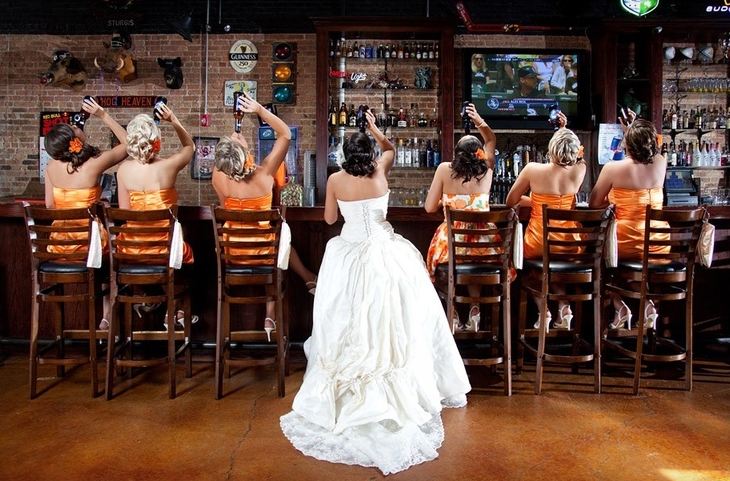 Bridesmaids with wide venue context