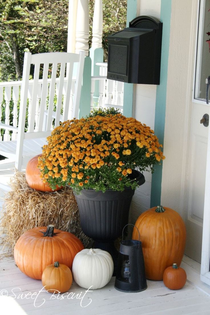 Stacked pumpkin planter fall porch idea