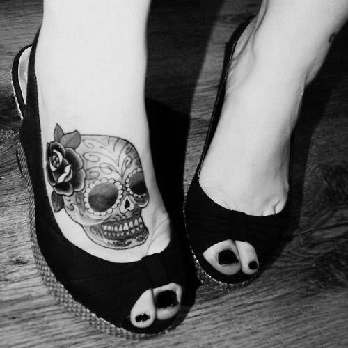 Bold color foot tattoo