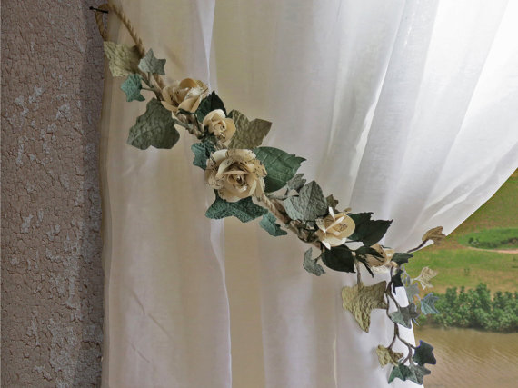 Metal rosette curtain holdback