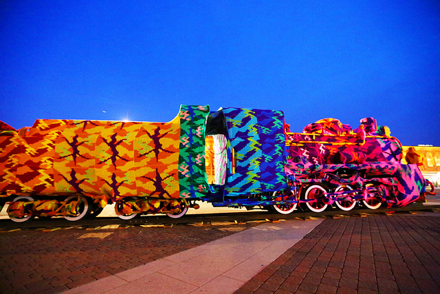 Olek crocheted train cars in Łódź