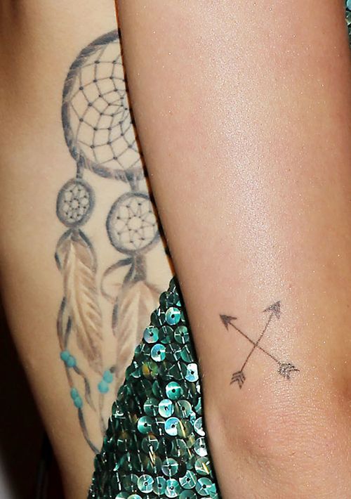 Tall arrow tattoo design
