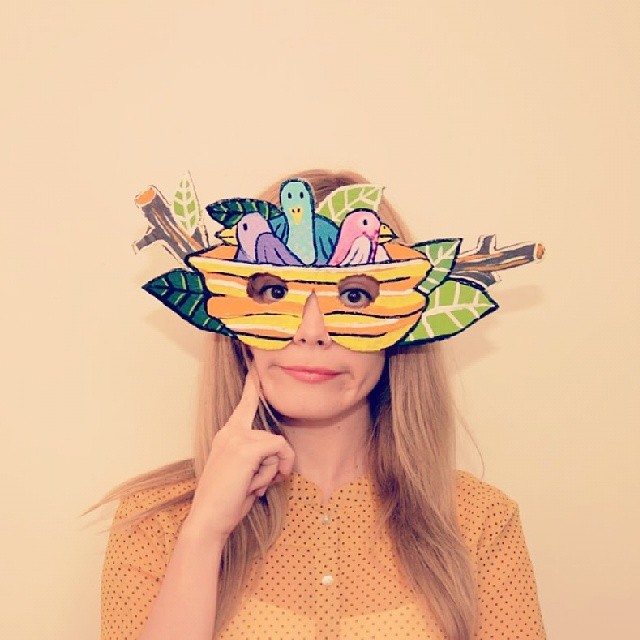 Bird nest cardboard mask with three baby birds