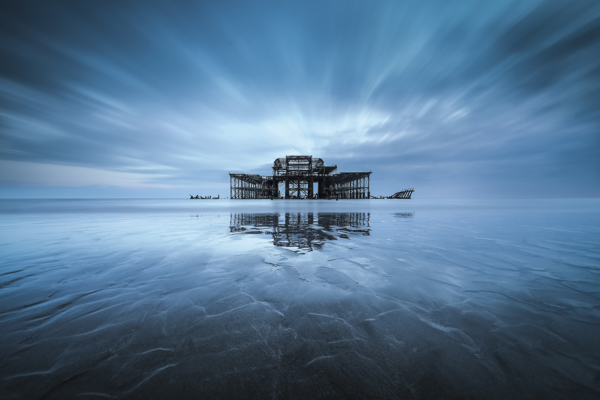West Pier silhouette in changing coastal light