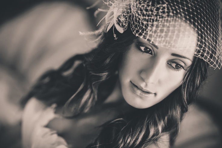 Bride wearing a classic birdcage veil with vintage-inspired styling