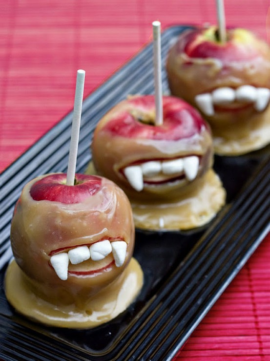 Vampire caramel apples with marshmallow teeth