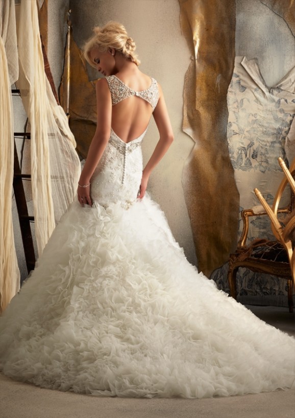 Voluminous bridal gown with soft fabric layers
