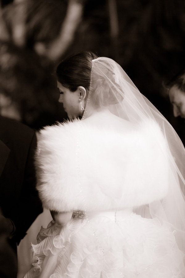 Winter bride in a tailored wedding cape