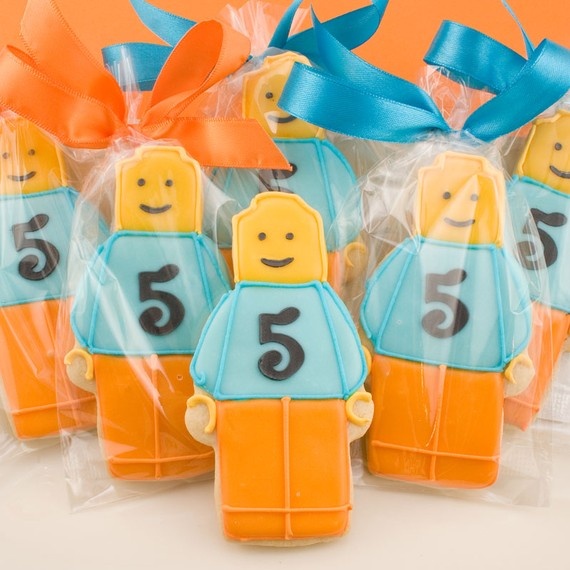 Packaged LEGO minifigure sugar cookies with ribbons