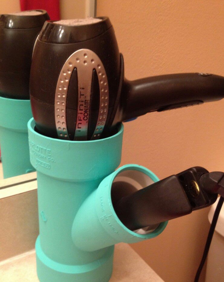 PVC pipe joint as bathroom organizer.