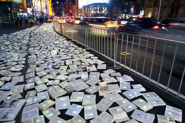 Book spines and LED light in the installation