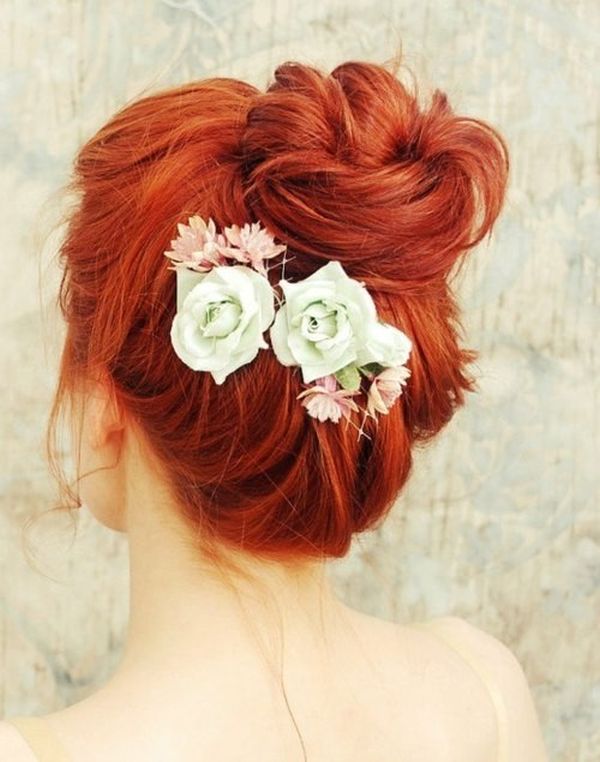Soft auburn red hair with side part