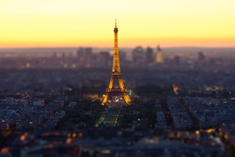 Eiffel Tower viewed across Paris in a composed landscape frame