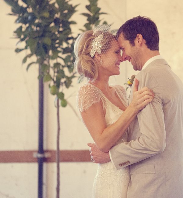 Birdcage veil styled for a stylish outdoor ceremony