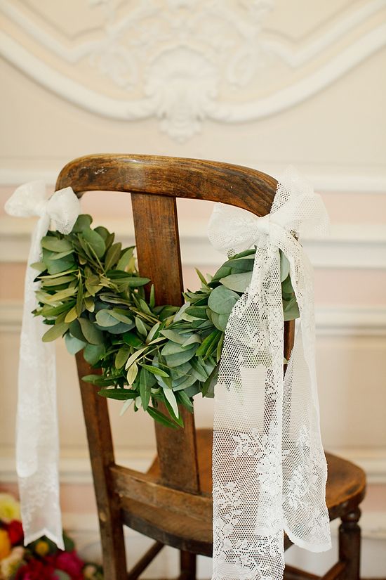 Floral sash on wedding chair