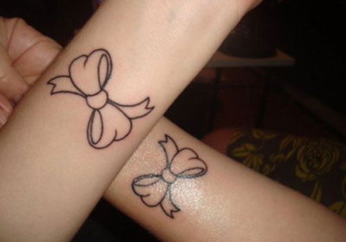 Sister matching tattoo art