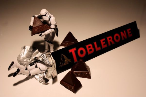 Stormtroopers with a Toblerone bar, one stuck in the foil wrapper
